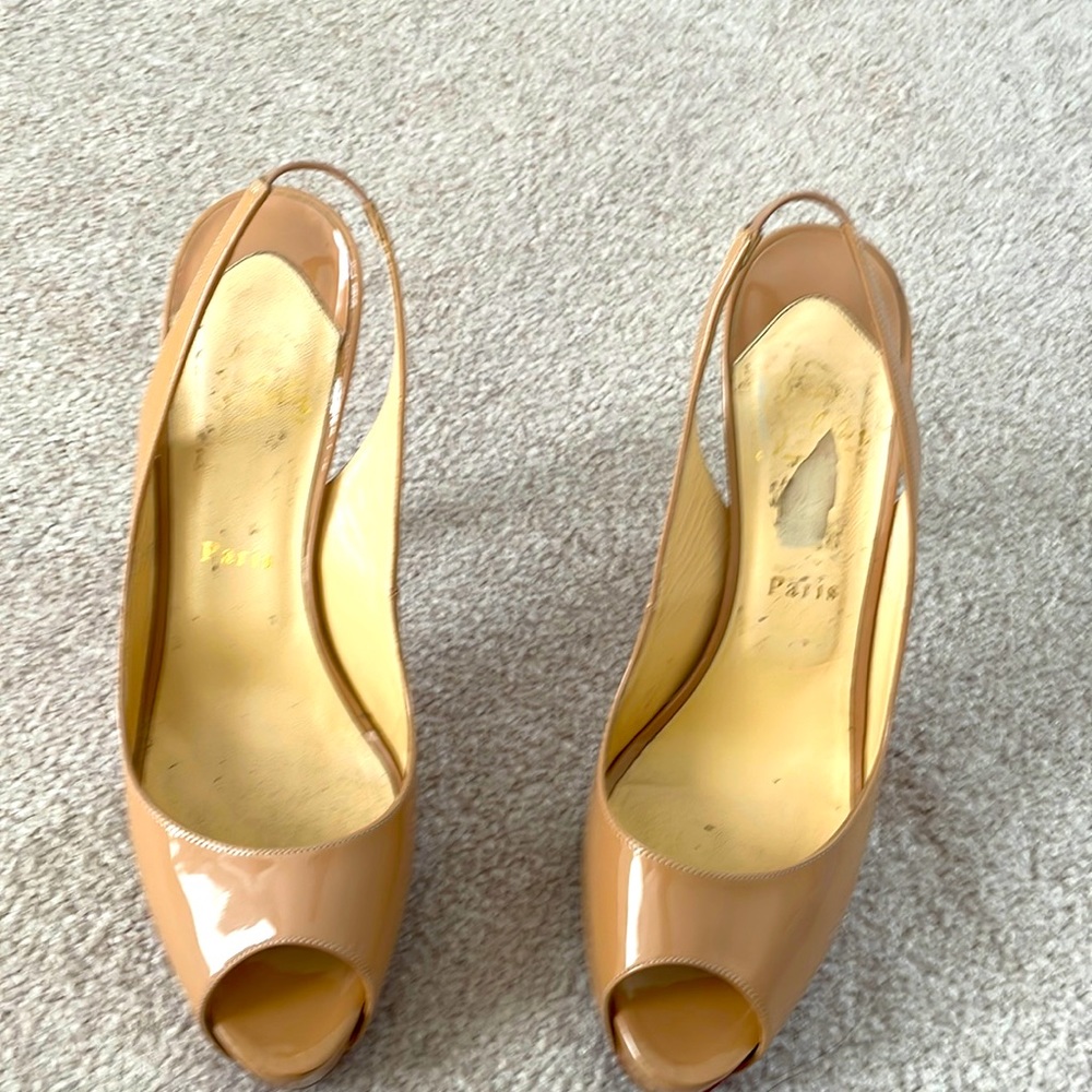 Christian Lounoutin Red soles Stilettos  120mm. Peep toe sling back strap .